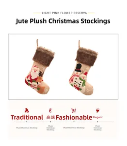 Detail of plush embroidered linen Christmas stockings with Santa, reindeer and snowman