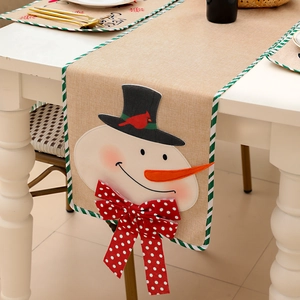 Linen Christmas table runner with 3D snowman embroidery and festive striped edging