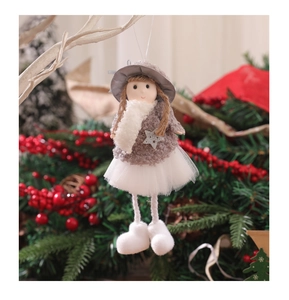 Detail of plush Christmas angel doll ornament with gray star sweater on a festive tree branch