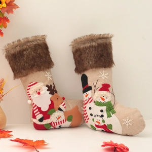 Set of 2 plush embroidered Christmas stockings with Santa and reindeer on burlap fabric