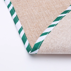 Christmas burlap table runner with snowman embroidery and green striped edge binding