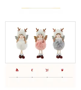 Three plush Christmas angel dolls with antlers in white, pink, and grey colors
