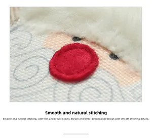 Close-up of embroidery details on burlap Christmas wine bottle cover with plush texture