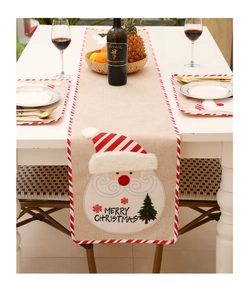 Linen Christmas table runner and mats set with embroidered Santa Claus decor