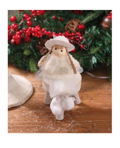 Detail of plush Christmas angel doll with white mesh skirt and silver snowflake sequin