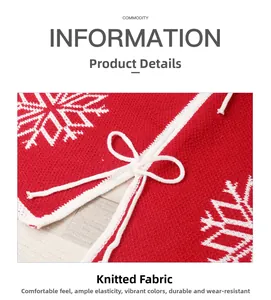 Detail of red knitted Christmas tree skirt with white snowflake patterns and tie closure
