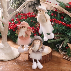 Three plush Christmas angel dolls in white pink and grey for holiday tree decoration
