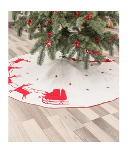 Dettaglio della gonna per albero di Natale in maglia bianca con renne e fiocchi rossi