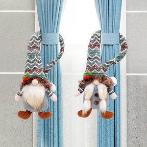 Christmas gnome curtain tiebacks set with knitted hats and gray felt bodies on blue curtains