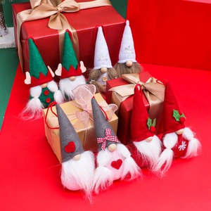 Set of 8 festive Christmas gnome hanging ornaments with plush details and holiday patterns