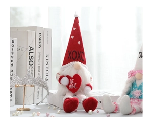 Detail of Valentine's gnome with XOXO hat and BE MINE heart in a gift setting