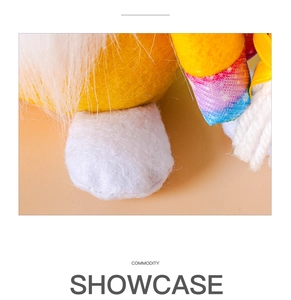 Macro shot of handmade felt fabric texture and rainbow stripe detail on gnome plush doll