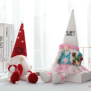 Pair of Valentine's Day plush gnomes with XOXO hearts for romantic home decoration