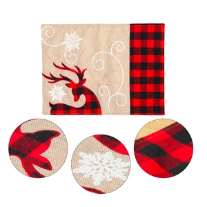 Linen Christmas table mat with reindeer embroidery and red buffalo plaid patterns