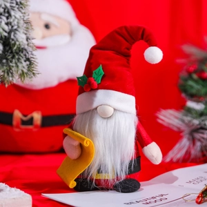 Plush Christmas gnome with red knit hat and white beard in a festive holiday scene