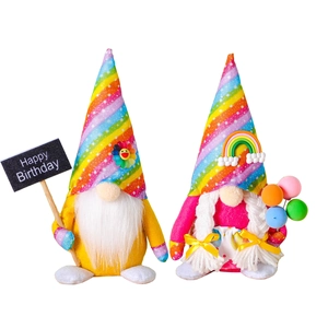 Pair of colorful birthday gnomes with rainbow hats and happy birthday signs set