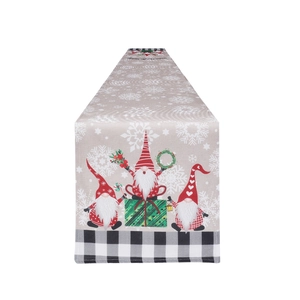 Linen Christmas table runner featuring red gnomes, snowflakes and buffalo plaid border