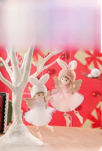 Detail of pink and white lace bunny ear angel doll pendants for Christmas tree decoration