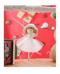 Detailed shot of Christmas angel doll hanging on a branch with white tutu and silver glitter shoes