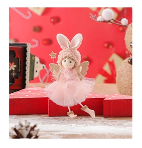 Close-up of pink bunny angel doll with lace dress and gold wings for Christmas tree decor