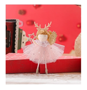 Detail of Christmas angel girl ornament with pink mesh skirt and golden antlers