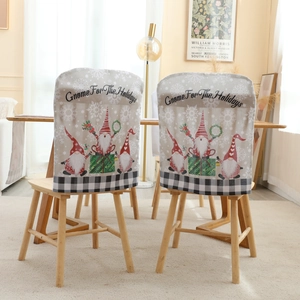 Set of 2 Christmas gnome chair covers with Gnome For The Holidays text on grey fabric