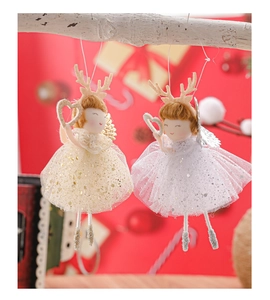 Detail of glitter lace skirt and antler headpiece on hanging Christmas angel dolls