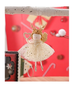 Detailed close-up of a Christmas angel doll hanging with golden antlers and sequins