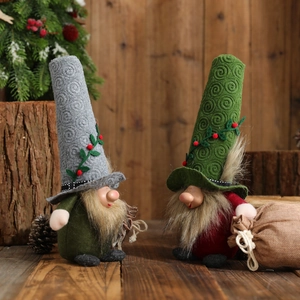 Set of two plush Christmas gnomes with spiral hats and festive berry decorations