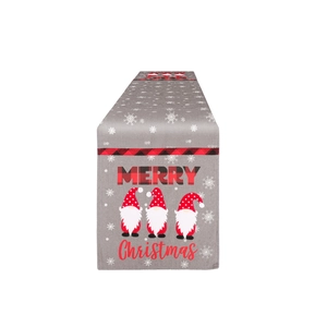 Christmas table runner with gnome print and red plaid borders on a grey fabric background
