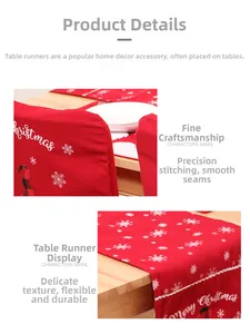 Detail of red plaid Christmas table runner and chair covers with snowflake embroidery