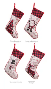 Detail of Christmas stockings with plaid patterns featuring Santa, Snowman, Tree, and Reindeer