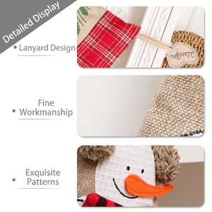 Linen Christmas stocking with snowman embroidery and red green plaid details