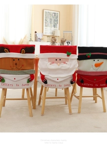 Detailed view of Santa, Snowman, and Elk chair covers with Letters to Santa embroidery