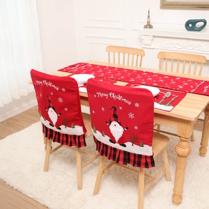 Christmas dining set with red Santa chair covers and plaid table runner for home decor