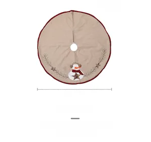Detail of 43-inch burlap Christmas tree skirt with snowman embroidery and JOY lettering