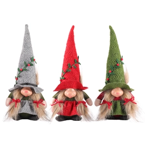 Three Christmas gnomes with grey red and green pointed hats and long braided pigtails