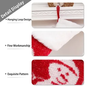 Knitted red Christmas stocking featuring white snowflake patterns and plush cuff detailing