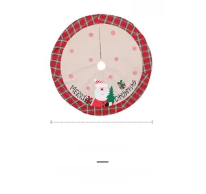 Close-up of 120cm Christmas tree skirt featuring red plaid border and Santa Claus motifs