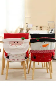 Detail of Christmas chair covers with Santa and Snowman embroidery and plush fabric