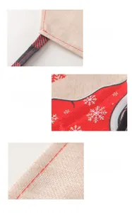 Detail of Christmas apron showing red snowflake patterns and red plaid strap stitching