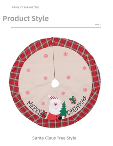 Detail of round Christmas tree skirt featuring Santa Claus motif and red plaid border