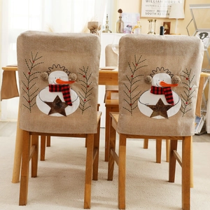 Christmas snowman chair covers made of burlap with JOY embroidery for holiday dining decor