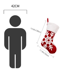 Large red Christmas stocking with snowflake embroidery and size comparison diagram