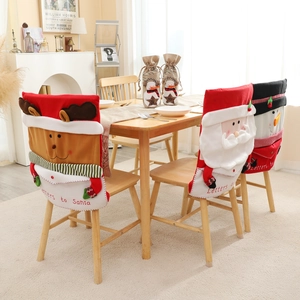 Christmas chair covers featuring Santa, snowman, and reindeer with gift pockets