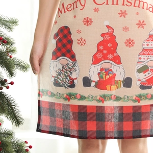 Christmas gnome apron with Merry Christmas lettering and red plaid festive decoration