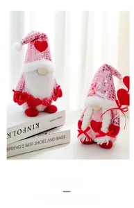 Close-up of Valentine gnome plush doll with pink sequins and heart-shaped accents