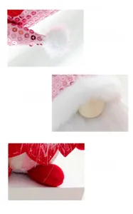 Detail of pink sequin hat and white long beard on Valentine's heart gnome decoration