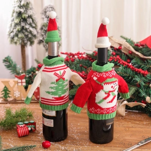 Creative knitted Christmas wine bottle sweater covers with festive snowman and tree patterns