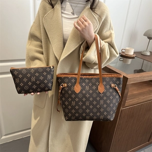 Brown monogram printed tote bag set with matching pouch for women in casual daily setting